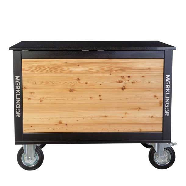 Modul ANTON Rückseite mit großem Holzpaneel und vier Lenkrollen.